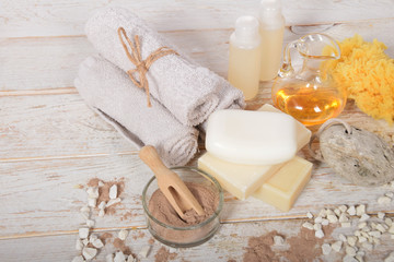 Cocoa powder mask for face and deco, orchid with natural soaps, and clean towels, home spa with free space for text