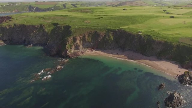Beautiful Sandy Beach, Clifftops & Clear Blue Ocean - Aerial Drone Footage
