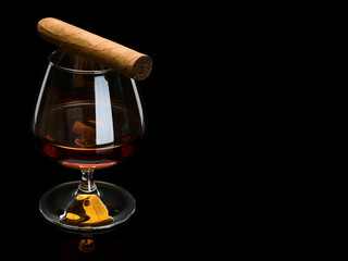 Cigar and cognac in a glass