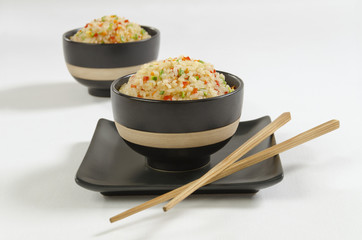 Asian rice bowls with chopsticks