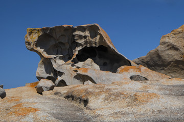 sky and mountain rock on the ocean