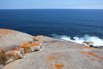 sky and mountain rock on the ocean
