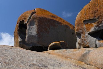 sky and mountain rock on the ocean