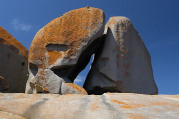 sky and mountain rock on the ocean