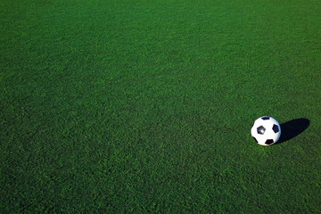 Football on a green field