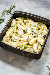 Italian pasta Conchiglioni Rigati stuffed with cheese and greens on concrete table