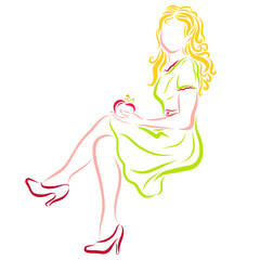 Beautiful blonde with ripe apple in hand