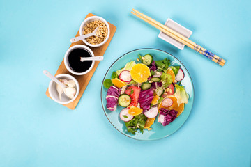 Organic vegetarian salad with vegetables and sauce.