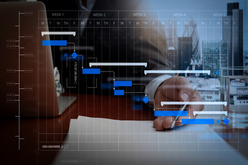 double exposure of businessman or salesman handing over a contract on wooden desk