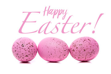 A group of Colorful Easter Eggs with speckles on a white background