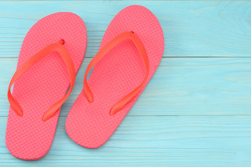 Summer blue background. Top view of beach summer accessories on blue wooden background with copy space