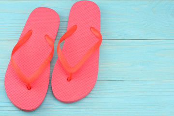 Summer blue background. Top view of beach summer accessories on blue wooden background with copy space