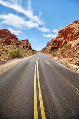 Fototapeta na wymiar Scenic deserted road, travel concept, Valley of Fire, Nevada, USA.