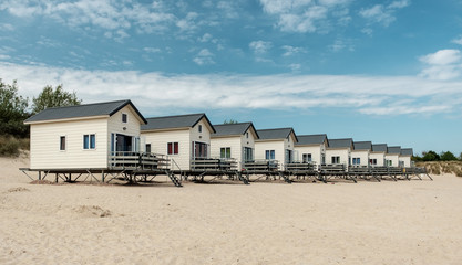 Row of Holiday houses on the beach of Zeeland