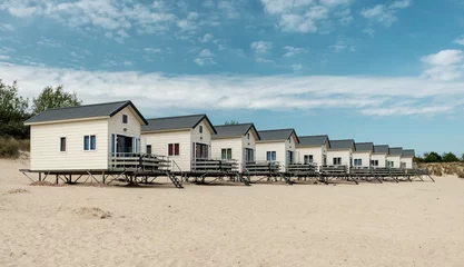 Zelfklevend Fotobehang Row of Holiday houses on the beach of Zeeland © Erik_AJV