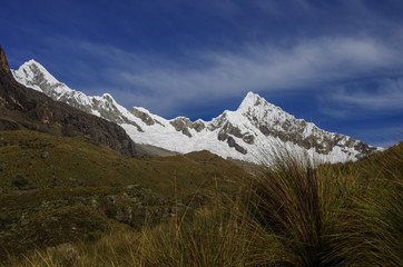 Amazing landscape around Alpamayo, one of highest mountain peaks in Peruvian Andes, Cordillera Blanca