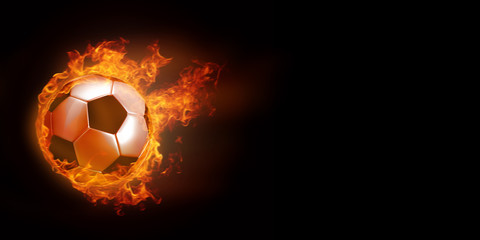  Soccer ball in fire against black background.