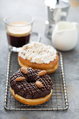 Chocolate and almond donuts with coffee