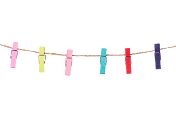 Color clothespins rope on white background isolation