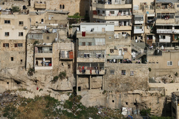 Jerusalem, Israel - May 16, 2018: View of houses behind the Wailing Wall and the City of David of...