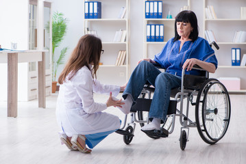Senior woman visiting doctor for regular check-up