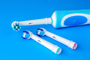 Electric Toothbrush on blue background