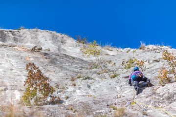 Escalader rise up to the peak