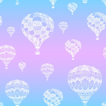 Vector seamless pattern of hot air balloon in zentangle style.White hand drawn hot air balloon on gradient background