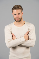 Guy in fashionable tshirt. Man with beard on unshaven face. Bearded man with blond hair. Hair care in barber salon or barbershop. Fashion style and trend