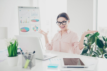 Portrait of financial enthusiastic cheerful accountant positive euphoric financier gesturing with...