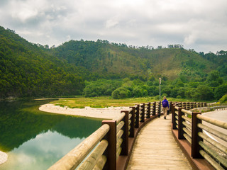 Fototapeta premium Person going through a bridge