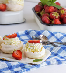 round baked meringue pie with strawberries