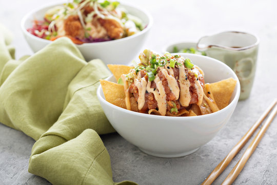 Poke bowl with fried wonton wrappers