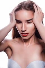 Beauty portrait of young expressive woman with clean skin and red lips