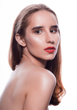 Beauty portrait of glamor brunette woman with red lips and naked shoulders