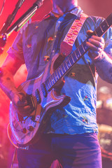 Naklejka premium Man with Guitar
