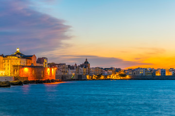 View of seaside of the sicilian city Trapani during sunset, Italy - obrazy, fototapety, plakaty