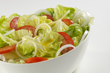 Fresh salad  in a white bowl