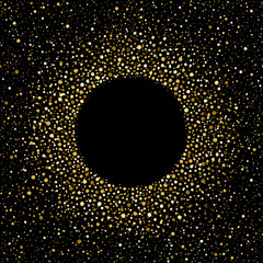 Golden splash or glittering spangles round frame with empty center for text. Gold circle made of tiny uneven dots abstract background. Golden blobs textured round frame on black backdrop. 