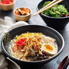 Spicy ramen bowl with noodles and chicken