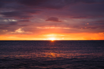 Fototapeta na wymiar By the sea, scenic colorful landscape at sunrise