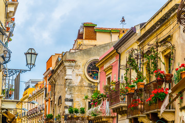 View of a narrow street in Taormina, Sicily, Italy