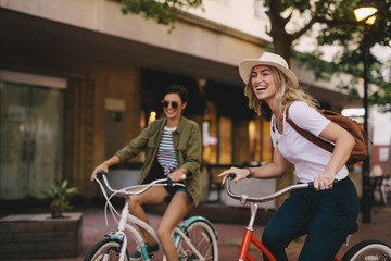 Female friends enjoying bicycle ride