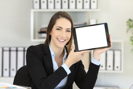 Office worker showing an horizontal tablet screen