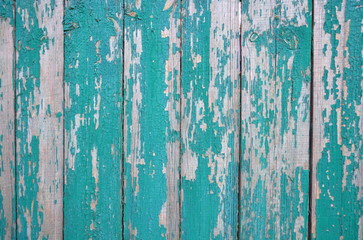 Background consisting of a texture of boards with peeled paint.