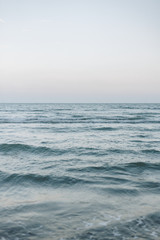 Fototapeta na wymiar Waves on a wide blue sea