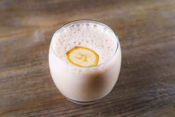 Banana milkshake, delicious smoothie, refreshing  sweet drink. Healthy tasty food for children