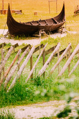 Part of old wooden viking boat in norwegian nature