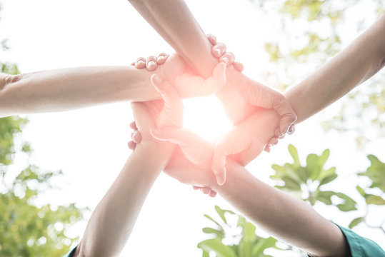 College Students Teamwork Stacking Hand Concept