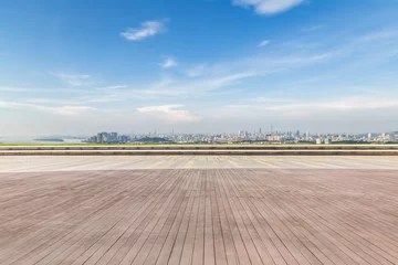Foto op Canvas Panoramic skyline and modern business office buildings with empty road,empty concrete square floor © MyCreative